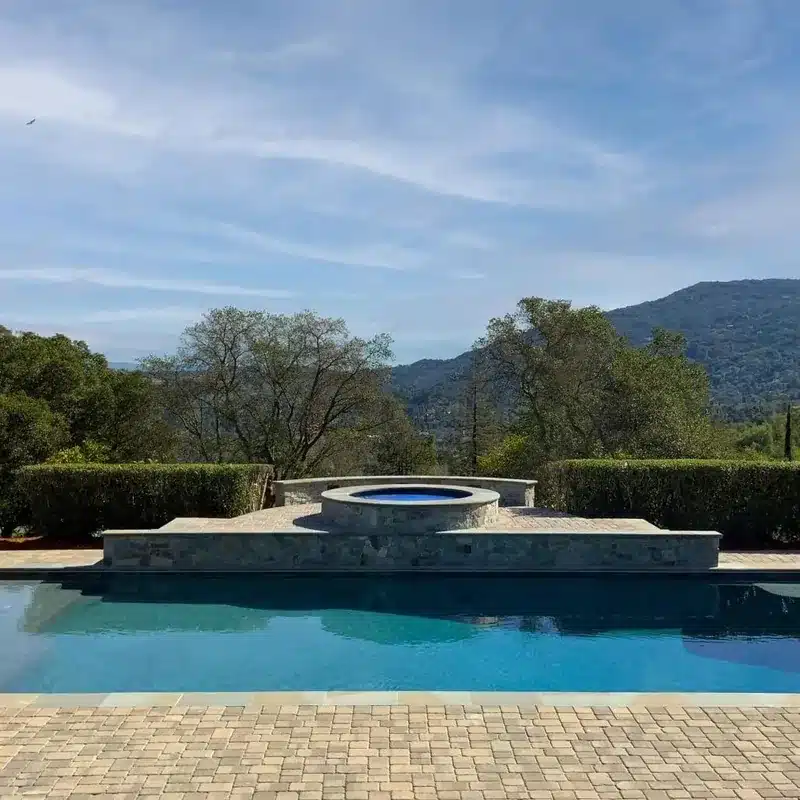 luxury Outdoor patio around a pool in Saratoga CA